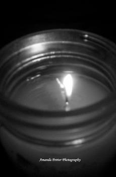 Prayer Candle - This photo is from the portfolio of Amanda Potter, my daughter. I have permission from her to share some of her photos. She is learning to be a photographer.