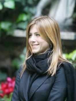 Jennifer Aniston Fashion - Jennifer sporting a very cute black jacket and scarf! :) 