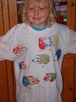 Fishy T-shirt - Here&#039;s my middle child, Sydney modeling Daddy&#039;s new T-shirt. The kids had a lot of fun making it, and loved the tickle of the brushes on their hands. :)