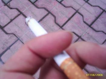 smoking - my tiny little hand with my tiny little cigarette