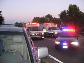 2 Ambulances - At the scene of an accident where 2 people were rushed with back & neck injuries. 