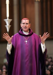 the bishop - the bishop is blessing the congregation