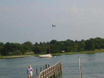 Parasailing - For those who do not know what Parasailing is, here is a picture of someone doing this watersport. I did it as well and loved every minute of it and wanted to stay up there longer. Everyone should try this at least once.