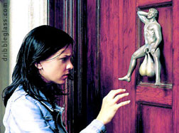 knocker - A door knocker is an item of door furniture that allows people outside a house to alert those inside to their presence. A door knocker has a part fixed to the door, and a part (usually metal) attached to it by a hinge that may be lifted and used to strike a plate fitted to the door, or the door itself, making a noise. The struck plate, if present, would be supplied and fitted with the knocker.

Door knockers are often ornate, but may be no more than a simple fitting with a metal bob or ring.