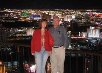 couple with Las Vegas Backgound - Thei was a cut and paste job to get them with the light of Vegas behind them. It was not done with a blue screen but htat would have made it easier.