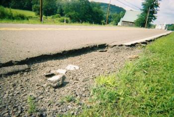 our "lovely" roads - This one cost us almost $900 dollars...he hit it, it knocked the car trailer off the truck, the trailer weaved out into the other lane and across the road, it then hit a phone pole, went through a fence and finally stopped on top of a cemetary! The damages to the trailer and the car on the trailer were almost $500 and he was fined almost $400 for the trailer coming loose, luckily insurance is supposed to cover the damages to the cemetary but we aren&#039;t sure about that yet...a lawyer said we should fight it and sue PennDOT for the damages but that was going to cost $500 more just the the retainer for the lawyer....we don&#039;t have the money. The $900 is equal to one full paycheck net.