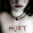 Carving:( - A carving of someone that is hurt..