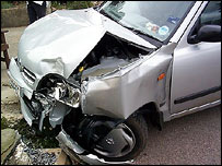 I wish! - A picture of a smashed car.