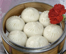 steamed dumpling - we call them bao zi in China,they are steamed.and they look delicious,right?