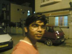 me... in mood - on bangalore streets... trying to smile when i dont want to