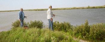 fishing pic - Hubby likes to go fishing whenever possible. This is a pic from Port Aransas, Texas.