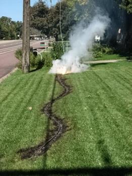 Electrical Fire - The wire down in my yard arching and burning the yard