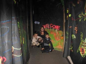 daughter,grandsons - At the entrance to the Halloween black light room at a local nature center festival. daughter,grandsons - At the entrance to the Halloween black light room at a local nature center festival.