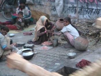 Homeless in India - Cooking meal on ther road side. 12 million people are homeless in India.