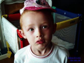 Silly boy - This is my son after I told him santa doesn&#039;t exist and I made him wear a girlies hat!