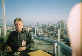 Russell At Rooftop Social In San Diego, California - Looks to me as if he&#039;s enjoying the food--but he actually didn&#039;t care for the food. Instead that look of pleasure comes from just being up on the rooftop where he can enjoy fresh air and a beautiful view way above the street-level of San Diego.

I&#039;d love to see him give me a look like that one of these days when we finally have face time!