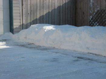 Piled Snow - At the edge of my garage.