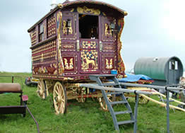 Romany Gypsy Caravan - A grand Romany Caravan in deep red and very ornate. Oh for the freedom!