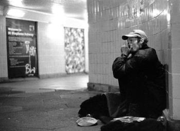 Smoking Kills - This is photograph of street side person smoking on railway platform