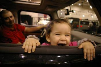 Millanah in one of the cars - Here is Mimi playing in the H3 Hummer with daddy.