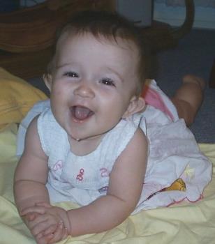 My granddaughter - This is my granddaughter Mackenzie, 8 months old, laughing as usual.
