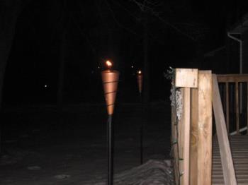 Tiki Torches are lit - Not cold outside either. It's 19 degrees and actually toasty warm. For me it is anyhow. HAHAHA!!