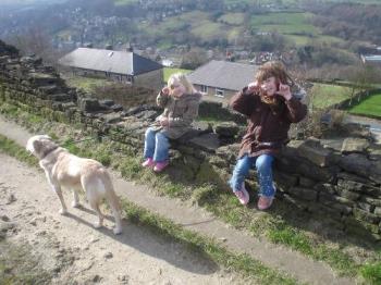 Nero and my kids in the hills above the village i  - The beauty of having pets like Nero is that he loves family outings. Here we had gone in to the hills in the village where we live, Nero loved it. Guinness, my cat however was waiting at home in ambush and was to smack nero round the nose much to his chargrin and dismay
blessed be 