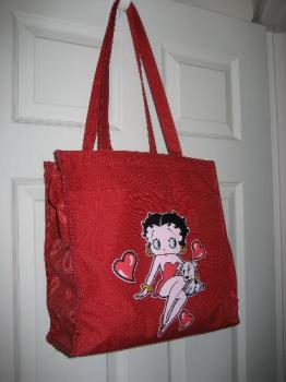 His Betty Boop Bag - I like it, too, but he is the kind of guy who isn't embarrassed to stand out in a crowd. 