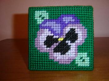 Pansy Coasters - Pansy coasters made with plastic canvas. These are washable. Pansy Coasters - Pansy coasters made with plastic canvas. These are washable.