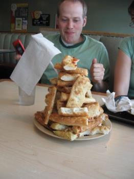 Pizza crusts-to snack or not to snack! - A leaning tower of Pisa from pizza crusts? Just eat &#039;em already!