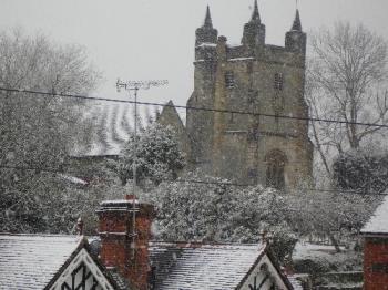 Snow Around the Church - A view of the snow, looking across to the Church, which is on a hill.. April 6th 2008 Snow Around the Church - A view of the snow, looking across to the Church, which is on a hill.. April 6th 2008