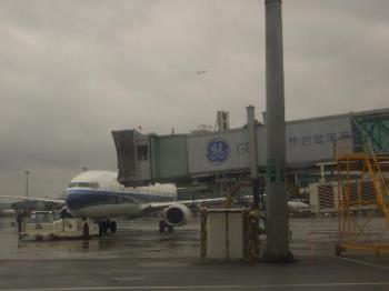 seeing the plane taking off - I was at the airport to take a plane to Guangzhou on a cold rainy day in January this year.