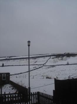 snow in my village  - evewn though it is spring time we still have snow in our village 
blessed be 