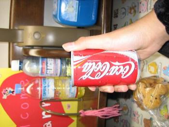 small coke - look how small the coke is,, haha