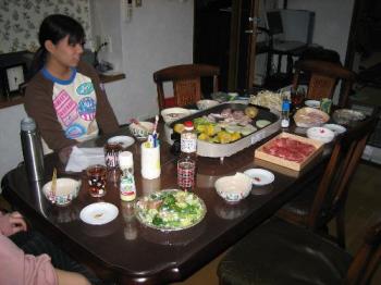 japanese food - That&#039;s what my Japanese host mother prepared for us for dinner. The japanese girl is my japanese host sister. Take a look at the meat that is to be cooked in front of us while we eat. :) Looks yummy, right?