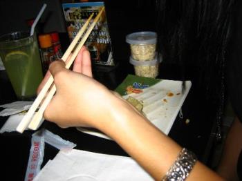 me using chopsticks - that&#039;s my hand. i&#039;m using chopsticks. :)