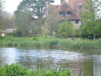 Michelham Priory - From Across The Moat - Michelham Priory taken from the other side of the moat, depicting the island which houses the priory building and gardens, holding in eight hundred years of English history. Michelham Priory - From Across The Moat - Michelham Priory taken from the other side of the moat, depicting the island which houses the priory building and gardens, holding in eight hundred years of English history.