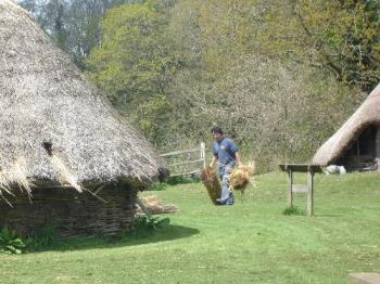 Michelham Priory - Iron Age Centre - Some Iron Age workshops built on the other side of the moat at Michelham Priory. All built from tree branches, and thatched, the buildings give an authentic, Iron Age feel to the area. Note the guy carrying batches of straw. :) Michelham Priory - Iron Age Centre - Some Iron Age workshops built on the other side of the moat at Michelham Priory. All built from tree branches, and thatched, the buildings give an authentic, Iron Age feel to the area. Note the guy carrying batches of straw. :)