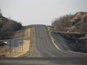 Rolling Hills of Southwest Manitoba in Spring - This photo was taken in early Spring right after most of the now had melted after a winter storm in the last week of April. Not very green yet...but it will be!