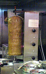 Doner Meat, rotating nicely - This is how the doner meat is cooked and as people order their food, it is sliced off the spit.