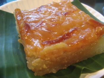 a slice of cassava cake - Native snack in the Philippines. Usually eaten during afternoon snacks or for dessert. One of the many kakanins in the Philippines.