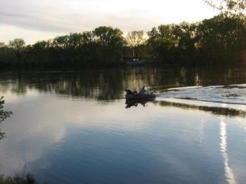 Fishermen on the Mississippi River - Fishermen coming in from a day of fishing on the Mississippi River