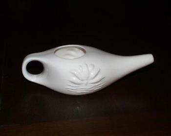 Neti Pot  - Neti pot used to clear nasal passages 