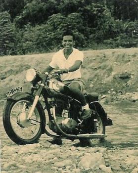 Dad in New Guinea - This might have been taken around 1958 or so. Dad and his motor cycle could not be separated. He always rode with his buds through the New Guinea jungles, rivers and on beaches. FUN!!!