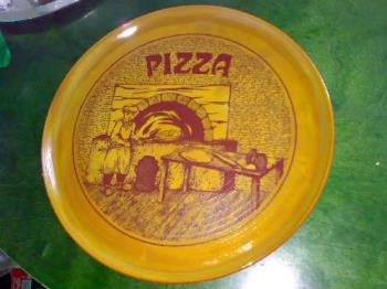 pizza plate - a huge pizza plate at home.