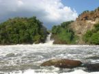 Murchison Falls - Murchison Falls, also known as Kabalega Falls or Kabarega Falls, is a waterfall on the Nile. It breaks the Victoria Nile, which flows across northern Uganda from Lake Victoria to Lake Kyoga and then to the north end of Lake Albert in the western branch of the East African Rift. [show location on an interactive map] 2°16'38.33?N, 31°41'0.05?E. At the top of Murchison Falls, the Nile forces its way through a seven metre gap in the rocks and tumbles 43 metres down, then flows westward into Lake Albert. The outlet of Lake Victoria sends around 300 cubic metres per second (11,000 ft³/s) of water over the falls, squeezed into a gorge less than ten metres (30 ft) wide.