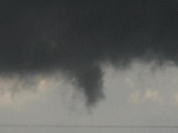 Twister returning to it's home - A bit fuzzy but it was far off in the sky. Twister returning to it's home - A bit fuzzy but it was far off in the sky.