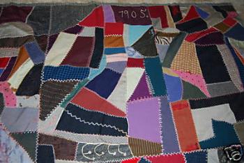 stitching on 1905 quilt - the best I can show the stitching, most of my pictures need to be resized because they only go as big as a thumbnail and you can't see the fine details. '1905' is emoidered up near the top. It kind of looks like 7905, but it's really just the style of the one. It's obviously a one when you look at it up close