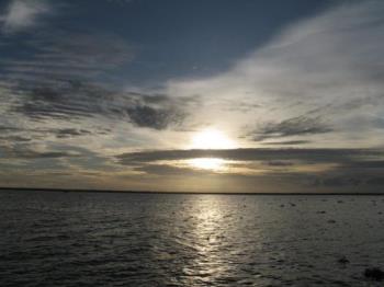 Sunset by the lake - I see the sunset often but rarely appreciate the beauty. Recently when we were vacationing at a place called Kumarakom in Kerala we went on a cruise at sunset and I took this awesome picture. The moment and the cruise were breath-taking. Enjoy it!