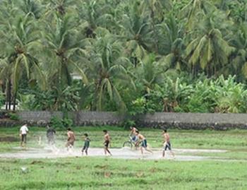 Playing foot ball in rain (Picture from kerala, In - Playing foot ball in rain (Picture from kerala, India) 